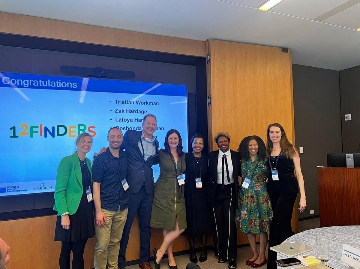 The 12 Finders team together at an accelerator programme graduation